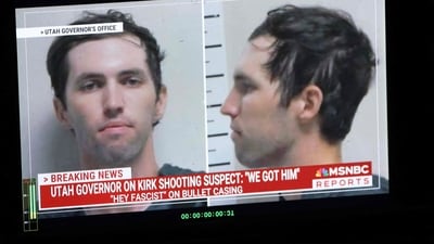 A TV monitor displays a picture of Tyler Robinson, the suspected of killing Charlie Kirk on September 11. (AFP) A TV monitor displays a picture of Tyler Robinson, the suspected of killing Charlie Kirk on September 11. (AFP)