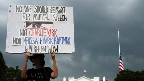 A protester advocating for gun reform holds a sign in front of the White House after U.S. right-wing activist, commentator, Charlie Kirk, was shot dead during an event at Utah Valley University, in Washington, D.C., September 11, 2025. REUTERS/Nathan Howard(REUTERS)
