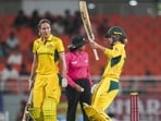 Australia's Phoebe Litchfield, right, celebrates her half century against India in the first ODI in New Chandigarh, Sunday. (PTI)
