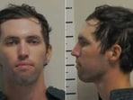 This combination of pictures created on September 13, 2025 using handouts released by the Utah Governor's Office on September 13, 2025 shows the booking photos of Tyler Robinson, the suspect in the shooting death of right-wing activist Charlie Kirk. This combination of pictures created on September 13, 2025 using handouts released by the Utah Governor's Office on September 13, 2025 shows the booking photos of Tyler Robinson, the suspect in the shooting death of right-wing activist Charlie Kirk.
