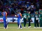 India's Suryakumar Yadav talks to Shivam Dube during the match