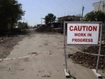 Meanwhile, the existing road too is riddled with potholes. The MIDC has begun patchwork but residents say temporary fixes are no substitute for a proper asphalted road. (HT) Meanwhile, the existing road too is riddled with potholes. The MIDC has begun patchwork but residents say temporary fixes are no substitute for a proper asphalted road. (HT)