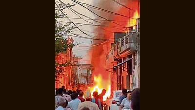 A major fire erupted after a paint laden vehicle rammed into a 315 KVA transformer in Iqbal Nagar on Tibba Road. (HT Photo) A major fire erupted after a paint laden vehicle rammed into a 315 KVA transformer in Iqbal Nagar on Tibba Road. (HT Photo)