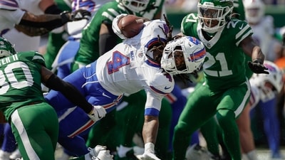 Buffalo Bills running back James Cook crosses the goal line to score a touchdown against the New York Jets. (AP) Buffalo Bills running back James Cook crosses the goal line to score a touchdown against the New York Jets. (AP)