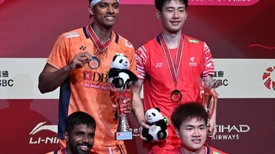 China's Liang Weikeng (bottom R) and Wang Chang (top R) pose on the podium following their win vs India's Satwiksairaj Rankireddy (bottom L) and Chirag Shetty (top L) in their men's doubles final match (AFP) China's Liang Weikeng (bottom R) and Wang Chang (top R) pose on the podium following their win vs India's Satwiksairaj Rankireddy (bottom L) and Chirag Shetty (top L) in their men's doubles final match (AFP)