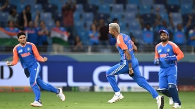 Hardik Pandya (C) celebrates with Shubman Gill (L) after taking the wicket of Saim Ayub during the Asia Cup 2025 match between India and Pakistan (AFP) Hardik Pandya (C) celebrates with Shubman Gill (L) after taking the wicket of Saim Ayub during the Asia Cup 2025 match between India and Pakistan (AFP)
