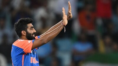 India's Jasprit Bumrah celebrates after taking the wicket of UAE's Alishan Sharafu. (AFP)