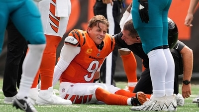 Cincinnati Bengals quarterback Joe Burrow (9) grimaces after being sacked by Jacksonville Jaguars defensive tackle Arik Armstead (91) (AP) Cincinnati Bengals quarterback Joe Burrow (9) grimaces after being sacked by Jacksonville Jaguars defensive tackle Arik Armstead (91) (AP)