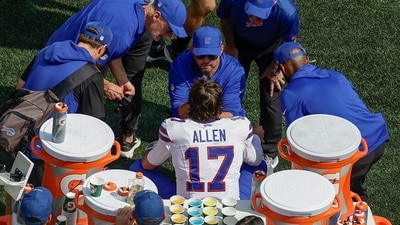 Trainers and coaches tend to Buffalo Bills quarterback Josh Allen's (17) bloody nose (AP) Trainers and coaches tend to Buffalo Bills quarterback Josh Allen's (17) bloody nose (AP)