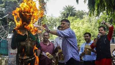 New Delhi: AAP leader Saurabh Bharadwaj burns an effigy during a protest against the upcoming Asia Cup cricket match between India and Pakistan, at the party office in New Delhi, Saturday, Sept. 13, 2025. (PTI) New Delhi: AAP leader Saurabh Bharadwaj burns an effigy during a protest against the upcoming Asia Cup cricket match between India and Pakistan, at the party office in New Delhi, Saturday, Sept. 13, 2025. (PTI)