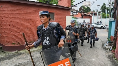 Security personnel keep vigil during a meeting of Prime Minister of Nepal's interim government Sushila Karki with families of victims of the recent protests, in Kathmandu, Nepal. (PTI)