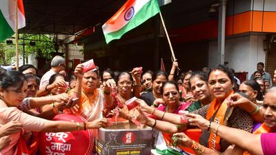 ShivSena (UBT) workers protested against the India vs Pakistan cricket match with the slogan "Maje kuku maza desh" outside Shiv Sena Bhavan, Shivaji Park, Dadar on Sunday. (Bhushan Koyande/HT Photo) ShivSena (UBT) workers protested against the India vs Pakistan cricket match with the slogan "Maje kuku maza desh" outside Shiv Sena Bhavan, Shivaji Park, Dadar on Sunday. (Bhushan Koyande/HT Photo)