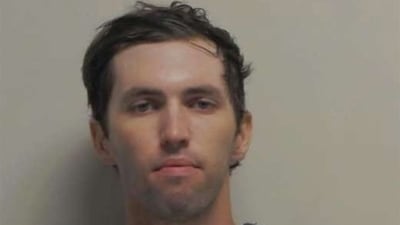 Cox said that Robinson was romantically involved with a transgender roommate, who his family described as a leftist. (AFP)