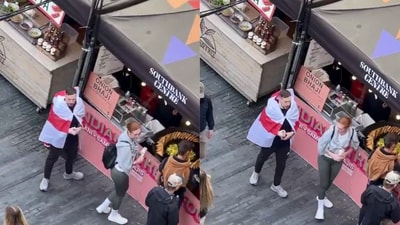 An anti-immigration protester stops for an Indian snack in a viral video (X/@MikeTown44) An anti-immigration protester stops for an Indian snack in a viral video (X/@MikeTown44)