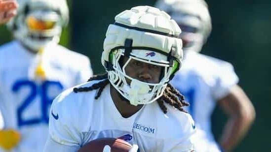 Buffalo Bills running back James Cook (4) runs with the ball during practice at the team’s NFL football training camp, Wednesday, July 23, 2025, in Pittsford, N.Y. (AP Photo/Adrian Kraus)(AP)