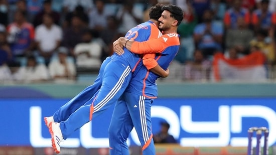 Kuldeep Yadav and Axar Patel, spin-twins nationally and in the IPL, formed a destructive tandem as they ensured Pakistan's middle order fell apart against their mix of control and threat. Kuldeep won player of the match with 3/18, and Axar contributed 2/18.(REUTERS)