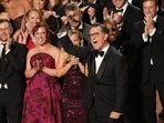 Stephen Colbert, center, and he team from "The Late Show with Stephen Colbert" accept the award for outstanding talk series during the 77th Primetime Emmy Awards.