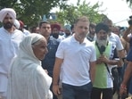 Congress leader Rahul Gandhi at flood-hit Ghonewal village in the Ramdas area of Ajnala sub division in Amritsar district on Monday. (Sameer Sehgal/HT)