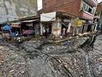 Homes in the narrow lanes of the Dhoka Mohalla were submerged in 3-4 feet of contaminated water on September 1. (HT Photo)