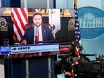 U.S. Vice President JD Vance appears on video monitors in the press briefing room as a guest presenter for the podcast of murdered right-wing influencer Charlie Kirk at the White House in Washington, D.C., U.S., September 15, 2025. REUTERS/Jonathan Ernst