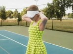 Dress Transformation: "Change this person’s outfit so it appears to be made entirely from tennis balls" Dress Transformation: "Change this person’s outfit so it appears to be made entirely from tennis balls"