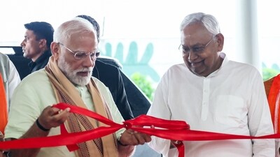 Prime Minister Narendra Modi and Bihar CM Nitish Kumar at the inauguration of a new terminal building at the Purnea airport on Monday. (Photo: PMO/ANI) Prime Minister Narendra Modi and Bihar CM Nitish Kumar at the inauguration of a new terminal building at the Purnea airport on Monday. (Photo: PMO/ANI)