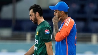 India's captain Suryakumar Yadav, right, and Pakistan's captain Salman Agha walk onto the field before the start of the Asia Cup cricket match (AP) India's captain Suryakumar Yadav, right, and Pakistan's captain Salman Agha walk onto the field before the start of the Asia Cup cricket match (AP)