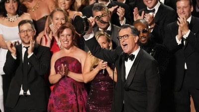 Stephen Colbert, center, and he team from "The Late Show with Stephen Colbert" accept the award for outstanding talk series during the 77th Primetime Emmy Awards. (Chris Pizzello/Invision/AP) Stephen Colbert, center, and he team from "The Late Show with Stephen Colbert" accept the award for outstanding talk series during the 77th Primetime Emmy Awards. (Chris Pizzello/Invision/AP)