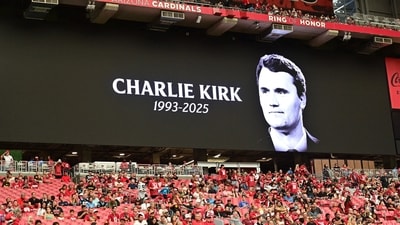 A moment of silence being observed for Charlie Kirk at an American football game. (IMAGN IMAGES via Reuters)