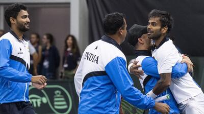 India's Sumit Nagal and team-mates celebrate their victory after the third single match of the Davis Cup World Group I round against Switzerland. (AP) India's Sumit Nagal and team-mates celebrate their victory after the third single match of the Davis Cup World Group I round against Switzerland. (AP)