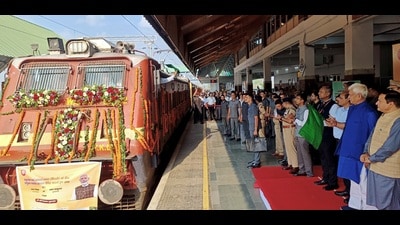 J&K LG Manoj Sinha flagging off a parcel train in Budgam on Monday. (HT)