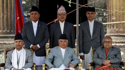 Nepal's President Ramchandra Paudel, along with Vice President of Nepal Ram Sahaya Prasad Yadav and interim Prime Minister Sushila Karki, poses for a picture with newly appointed Finance Minister Rameshore Khanal, Energy Minister Kulman Ghising, and Home Minister Om Prakash Aryal after administering the oath of office. (REUTERS)