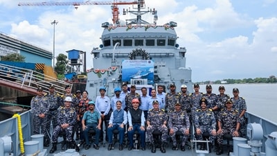 Officials of the Indian Navy and Garden Reach Shipbuilders and Engineers (GRSE) during the handing over ceremony of 'Androth'. (PTI) Officials of the Indian Navy and Garden Reach Shipbuilders and Engineers (GRSE) during the handing over ceremony of 'Androth'. (PTI)