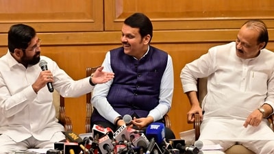 Maharashtra CM Devendra Fadnavis of BJP (centre) along with deputy CM Eknath Shinde of Shiv Sena (left) and deputy CM Ajit Pawar of NCP (right) at a press conference in Mumbai. (Anshuman Poyrekar/HT Photo)