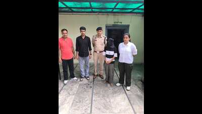 The accused woman in the custody of Panchkula police. (HT) The accused woman in the custody of Panchkula police. (HT)