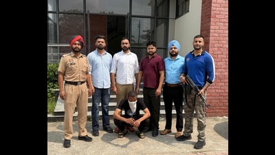 The arrested accused in police custody on Monday. (HT Photo)
