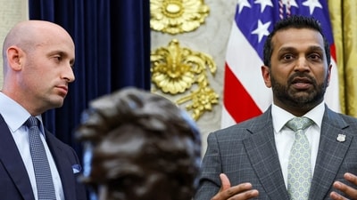 FBI Director Kash Patel speaks and White House Deputy Chief of Staff Stephen Miller listens during an event. (REUTERS)