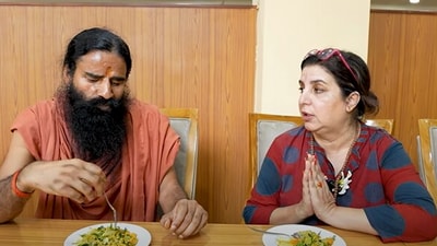 Filmmaker Farah Khan visited Baba Ramdev's ashram for her cooking vlog, engaging in witty banter. Filmmaker Farah Khan visited Baba Ramdev's ashram for her cooking vlog, engaging in witty banter.