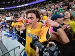 Gold medallist Sweden's athlete Armand Duplantis celebrates his new world record in the men's pole vault final during the World Athletics Championships in Tokyo. Gold medallist Sweden's athlete Armand Duplantis celebrates his new world record in the men's pole vault final during the World Athletics Championships in Tokyo.