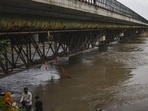 The Yamuna flows in spate at ITO in New Delhi on August 8. (PTI) The Yamuna flows in spate at ITO in New Delhi on August 8. (PTI)
