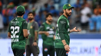 Pakistan's captain Salman Agha (R) reacts at the end of the Asia Cup 2025 match against India at the Dubai International Stadium (AFP) Pakistan's captain Salman Agha (R) reacts at the end of the Asia Cup 2025 match against India at the Dubai International Stadium (AFP)