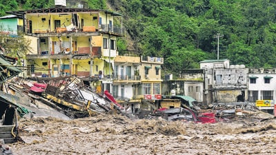 Damaged houses alongside a river following heavy rain in Sahastradhara near Dehradun on Tuesday. (PTI) Damaged houses alongside a river following heavy rain in Sahastradhara near Dehradun on Tuesday. (PTI)