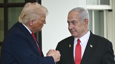 US President Donald Trump shakes hands with Israeli Prime Minister Benjamin Netanyahu as Netanyahu departs the White House in Washington, DC. (AFP file) US President Donald Trump shakes hands with Israeli Prime Minister Benjamin Netanyahu as Netanyahu departs the White House in Washington, DC. (AFP file)