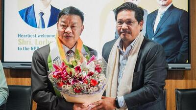 Former Lok Sabha MP Dr Lorho S Pfoze was welcomed by National People’s Party (NPP) chief and Meghalaya chief minister Conrad K. Sangma Former Lok Sabha MP Dr Lorho S Pfoze was welcomed by National People’s Party (NPP) chief and Meghalaya chief minister Conrad K. Sangma