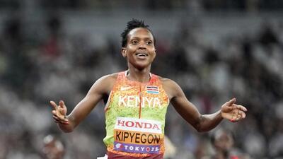 Kenya's Faith Kipyegon celebrates winning the gold in the women's 1,500 meters final at the World Athletics Championships in Tokyo, Tuesday. (AP) Kenya's Faith Kipyegon celebrates winning the gold in the women's 1,500 meters final at the World Athletics Championships in Tokyo, Tuesday. (AP)