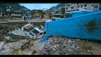 Mandi has been facing continuous rain since Monday night with the bus stand at Dharampur flooded, the officials said, adding buses and vehicles were swept away in the strong flow of water. (Deepak Sansta/ HT) Mandi has been facing continuous rain since Monday night with the bus stand at Dharampur flooded, the officials said, adding buses and vehicles were swept away in the strong flow of water. (Deepak Sansta/ HT)