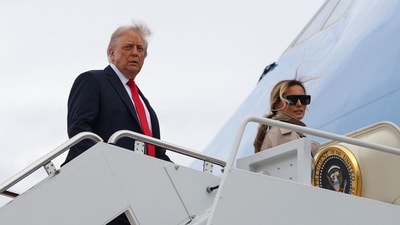 Donald Trump (L) and first lady Melania Trump board Air Force One ahead of UK visit (Getty Images via AFP) Donald Trump (L) and first lady Melania Trump board Air Force One ahead of UK visit (Getty Images via AFP)