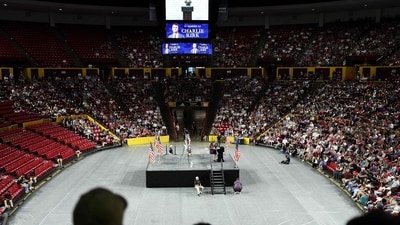 A person speaks onstage during a vigil in memory of right-wing activist Charlie Kirk at Desert Financial Arena on the campus of Arizona State University in Tempe, Arizona, on September 15, 2025 (Photo by CHARLY TRIBALLEAU / AFP) (AFP) A person speaks onstage during a vigil in memory of right-wing activist Charlie Kirk at Desert Financial Arena on the campus of Arizona State University in Tempe, Arizona, on September 15, 2025 (Photo by CHARLY TRIBALLEAU / AFP) (AFP)