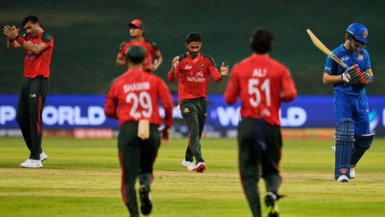 Bangladesh beat Afghanistan by eight runs in a group league match to remain in contention for a place in the Super Four stage of the Asia Cup.(AP)