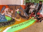 A sand artist working on a sculpture of Prime Minister Narendra Modi on his birthday in Varanasi on Wednesday. (PTI PHOTO) A sand artist working on a sculpture of Prime Minister Narendra Modi on his birthday in Varanasi on Wednesday. (PTI PHOTO)